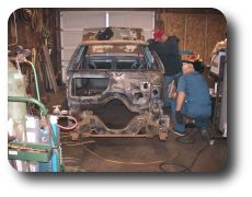  Dad is cutting out the floor where the front halo support bar welds to the frame.