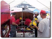 Installing the restrictor plate. ROMCO's Terry Barden is overseeing.